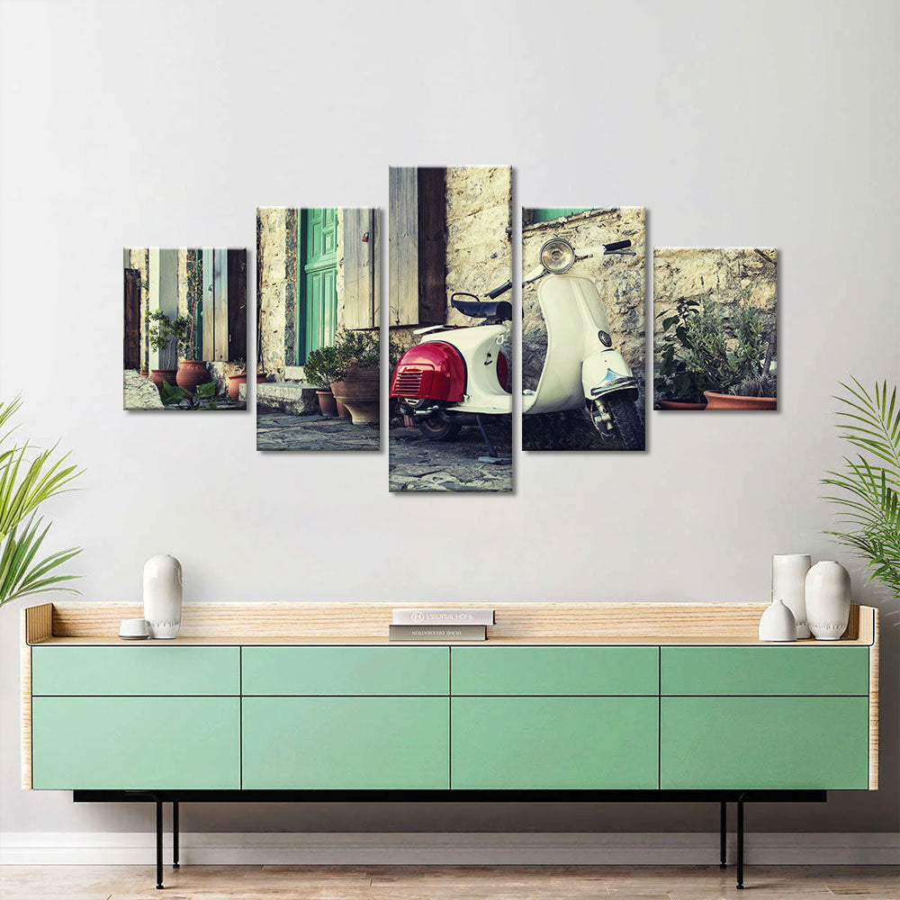 Old scooter in street of Karpathos Canvas Wall Art