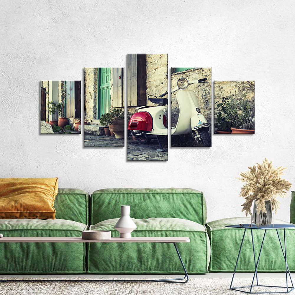 Old scooter in street of Karpathos Canvas Wall Art