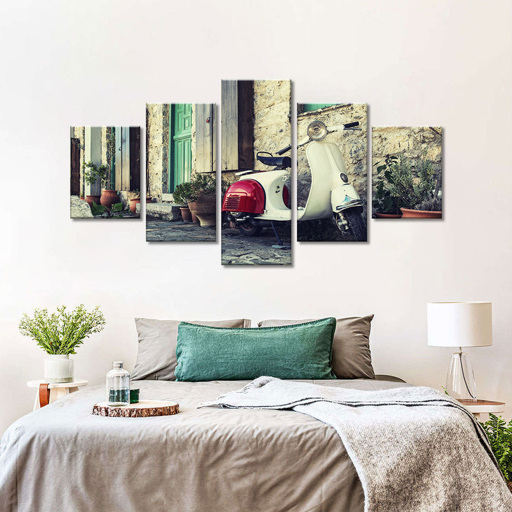 Old scooter in street of Karpathos Canvas Wall Art