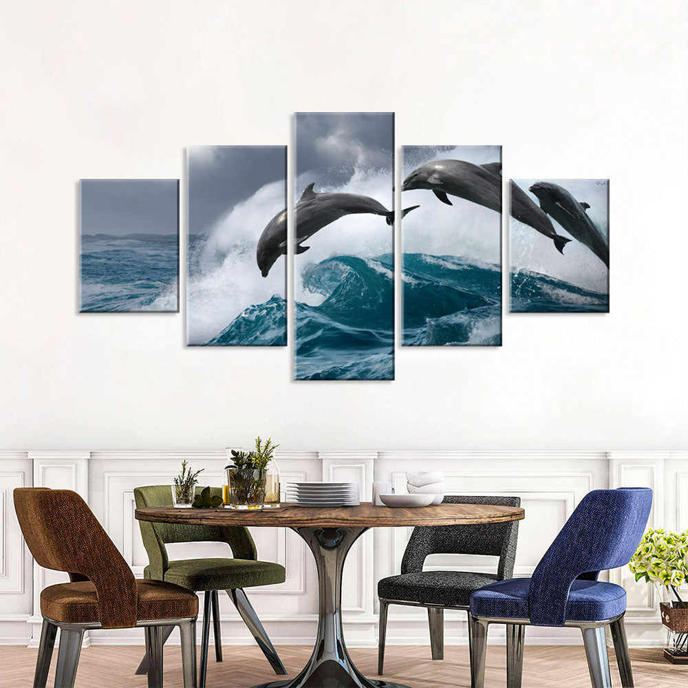 Dolphins Jumping Over Breaking Wave Canvas Wall Art