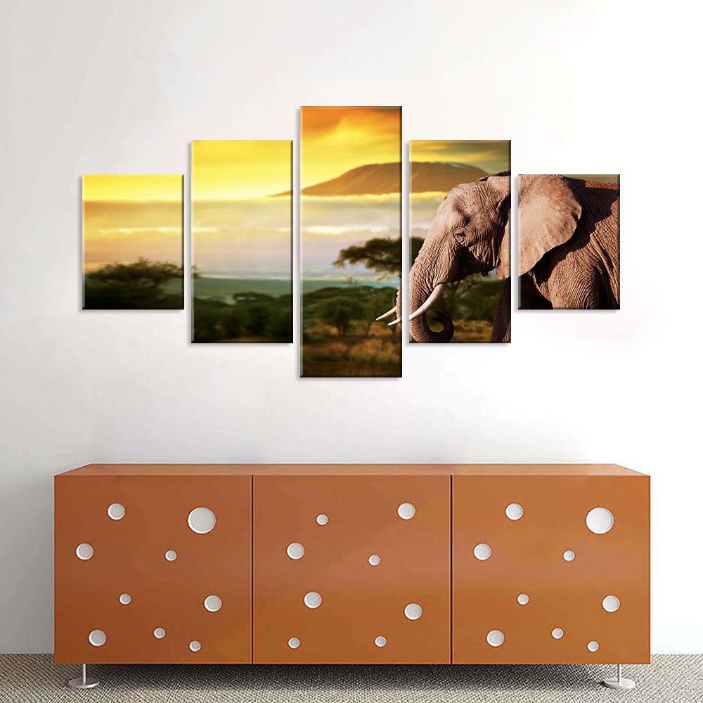 Elephant Walking in Front of Kilimanjaro Canvas Wall Art