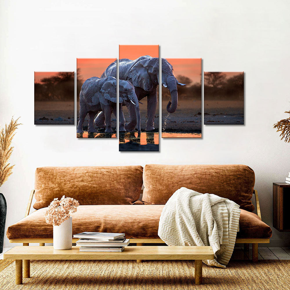 Elephants Walking at Sunset Canvas Wall Art