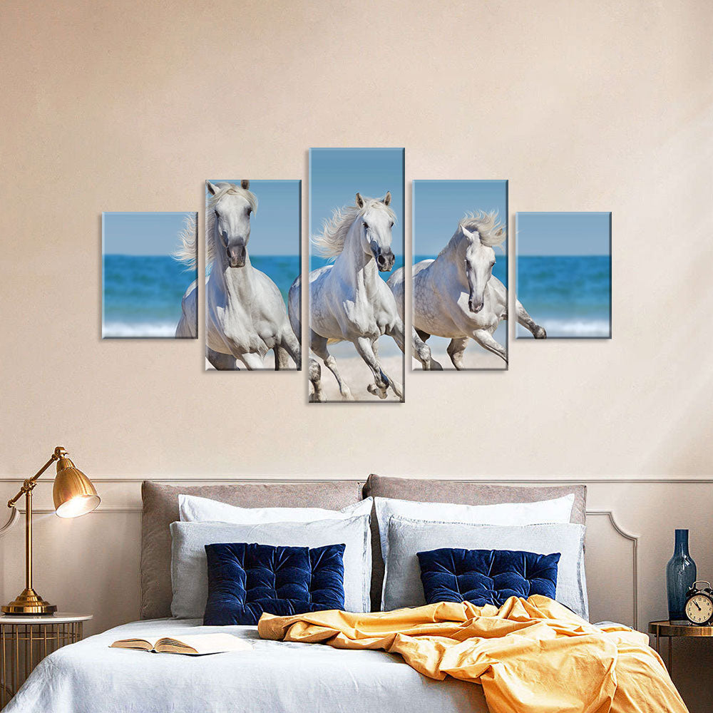 Three White Horses Running On The Beach Canvas Wall Art