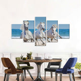 Three White Horses Running On The Beach Canvas Wall Art