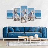 Three White Horses Running On The Beach Canvas Wall Art