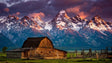 Grand Barn At The Foot Of Majestic Mountains Canvas Wall Art